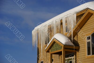 Large icicles on Townhouses after heavy snowstorm