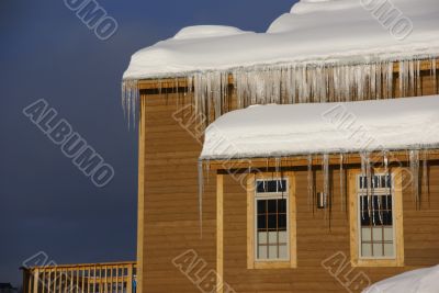 Large icicles on Townhouses after heavy snowstorm