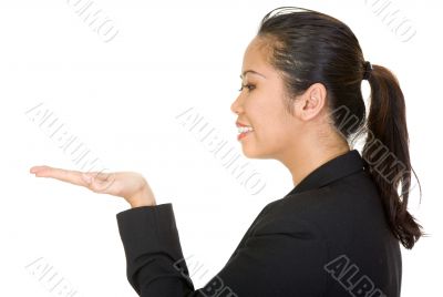 asian business woman holding something on her hand