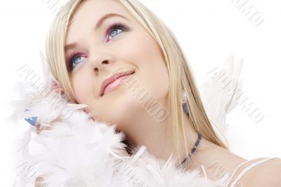 happy blond angel girl with feather boa