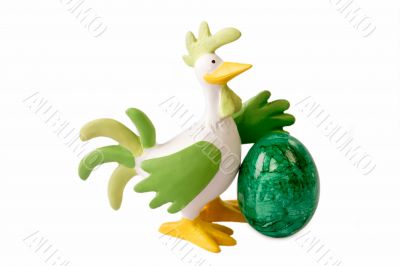 Cock with green egg