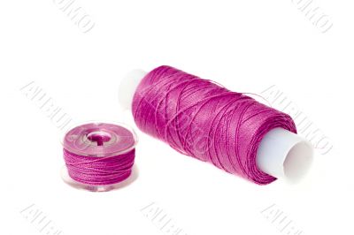 spool of pink thread
