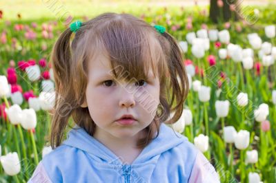 Girl near tulips