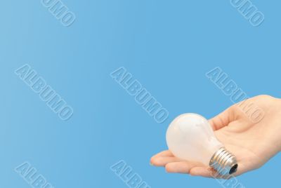 Background with lit lightbulb