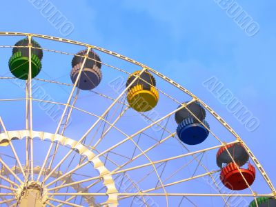 Big ferris wheel on blue sky