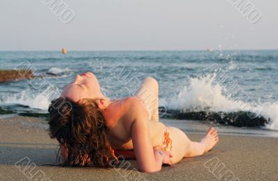 laying on sand laying on sand