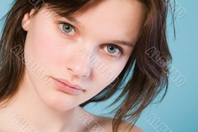 Girl with short hair on a blue background