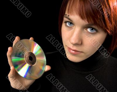 Girl holding a compact disc