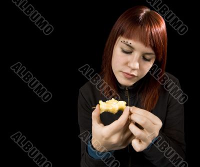 Girl eating apple.