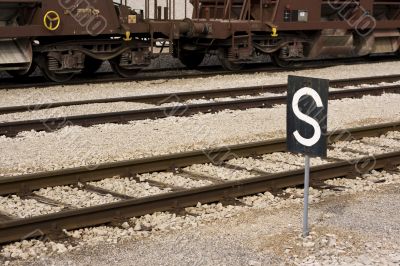 Train station stop with sign Train station stop with sign
