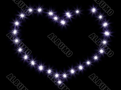 Heart from shining stars on a black background