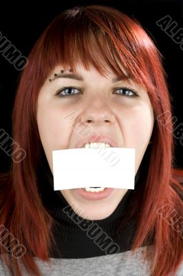 Girl biting a blank greeting card