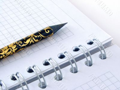 pencil and notebook