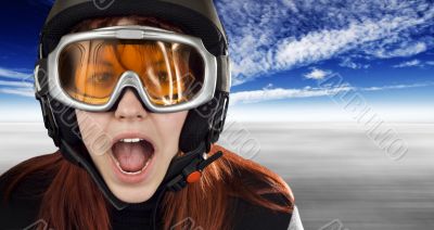 Cute girl with snowboarding helmet and goggles