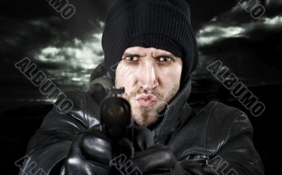 Undercover agent firing gun in the camera