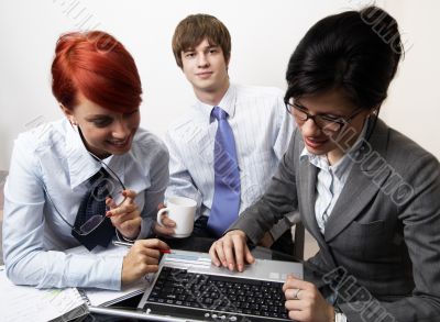 confident young manager at work with laptop