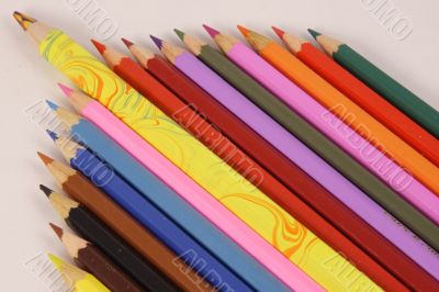Color pencils and one big pencil
