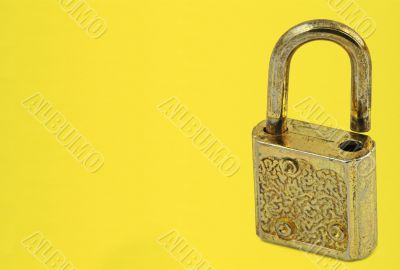 padlock on yellow