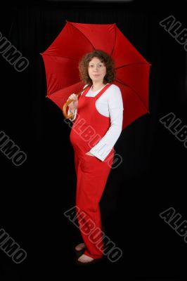 pregnant with red umbrella