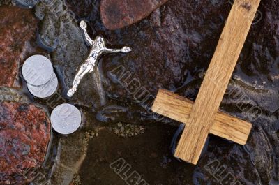 Cross, coins and Jesus figure. Cross, coins and Jesus figure.