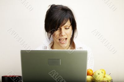 beautiful caucasian woman with laptop singing