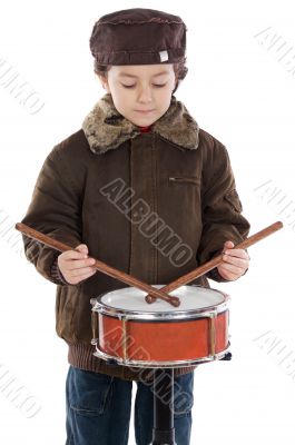 Child playing the drum