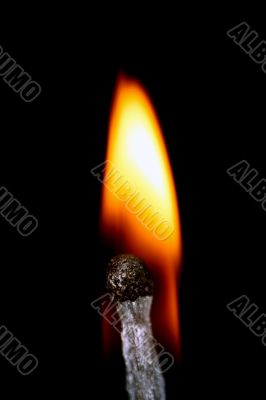 Match with smoke isolated in dark background