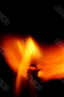 Match with smoke isolated in dark background