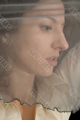 woman behind a net