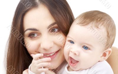 smiling baby in mother hands 2