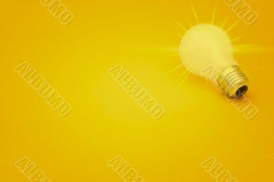 Background with lit lightbulb