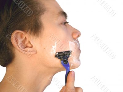 The young man shaving on morning the face