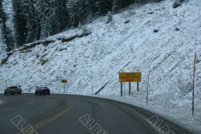 Traffic on icy mountain road