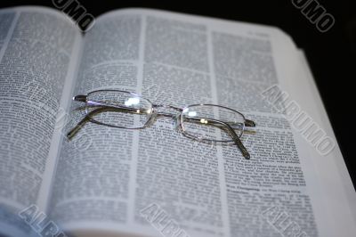 Glasses on book