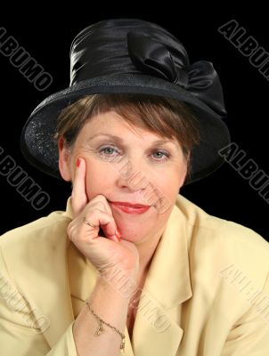 Thoughtful Woman In Hat
