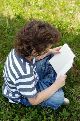 Child reading a book Child reading a book