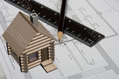 The engineering drawing on a paper. Ruler. Pencil.