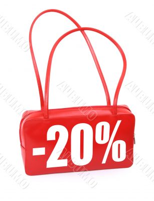 red leather handbag with sale sign