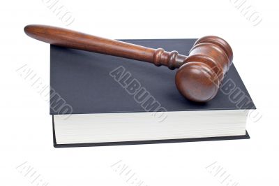 Wooden gavel and law book