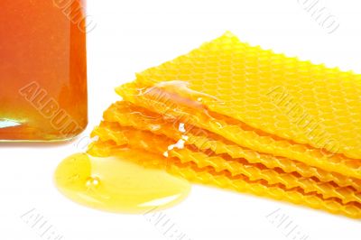 Honeycomb with honey and jar