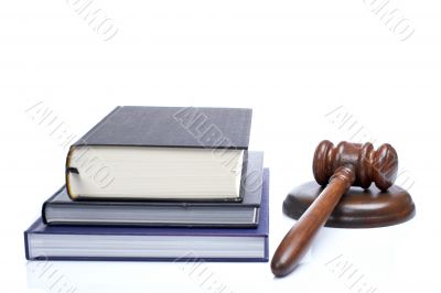 Wooden gavel and law books