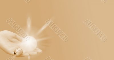 Background with lit lightbulb