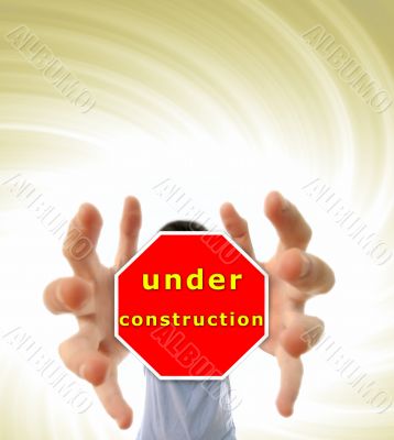 Man grabing a red sign.