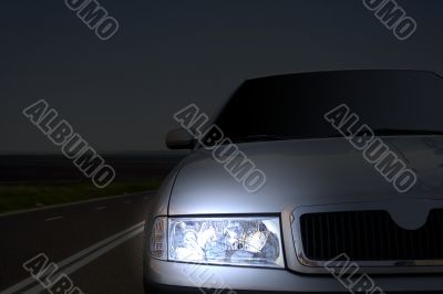 Fast car on the highway.closeup