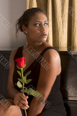 African-American  sexy girl with rose