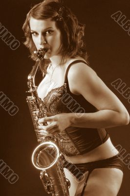 Retro female saxophonist - retro sepia style