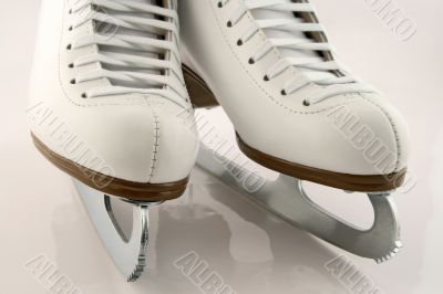 A pair of white figure skates