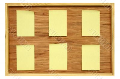 Notice board with six blank stickies