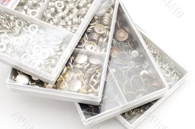Metal button in boxes