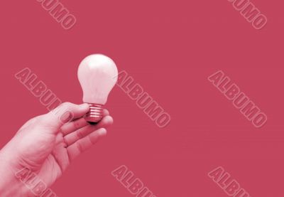 Background with lit lightbulb